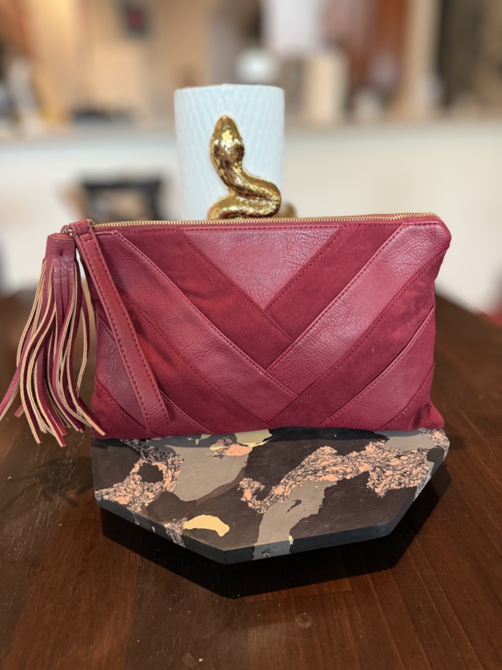 Carlos by Carlos Santana Chevron Patchwork Clutch in Burgundy with Tassel